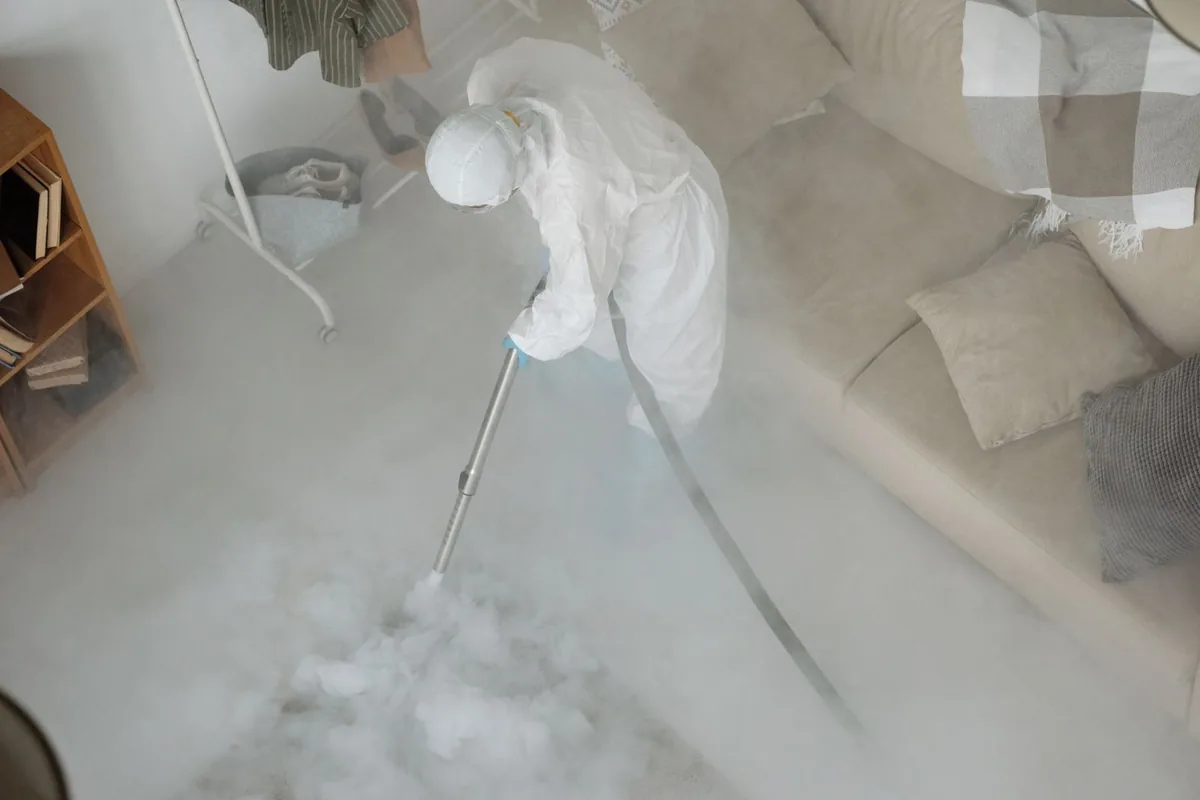 Biohazard cleanup technician in protective equipment, Castle Rock, WA
